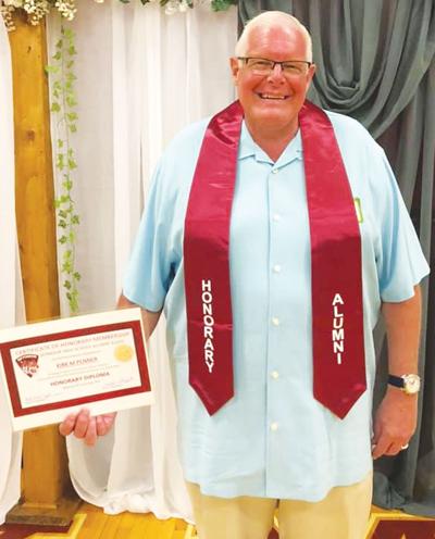 Penner earns honorary alumni status