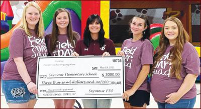 - PTO presented a check for $3,000 or new playground equipment