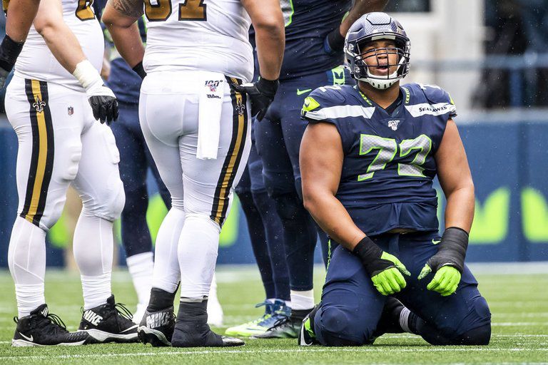 Defensive tackle Al Woods re-signing with Seahawks