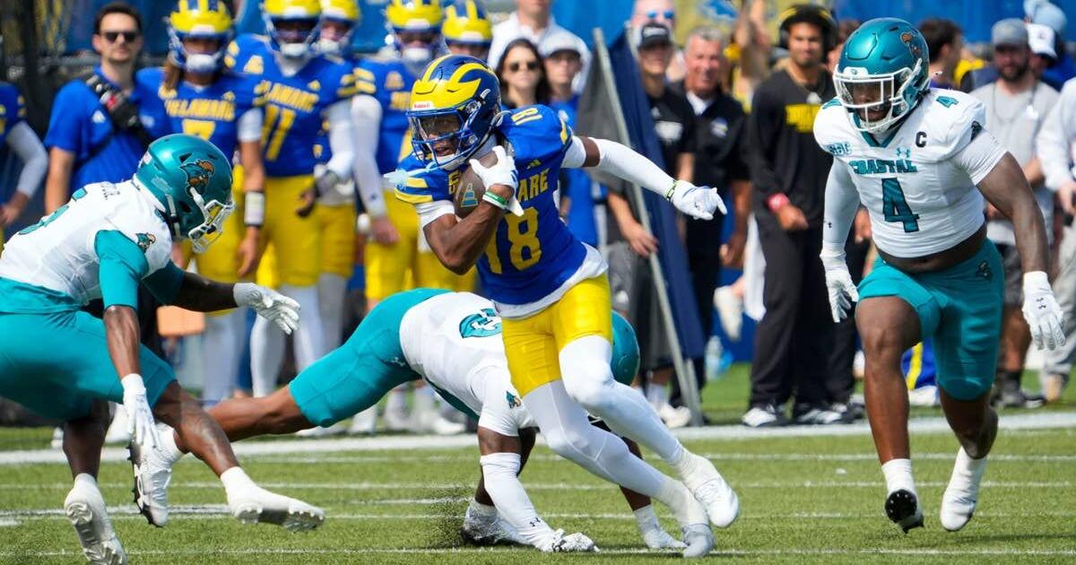 delawares-sean-wilson-takes-a-reception-downfield-in-the-blue-hens%c2%92-22-14-win-against-coastal-carolina-at-delaware-stadium-on