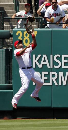 Angels break up no-hitter but still lose in blowout to Mariners