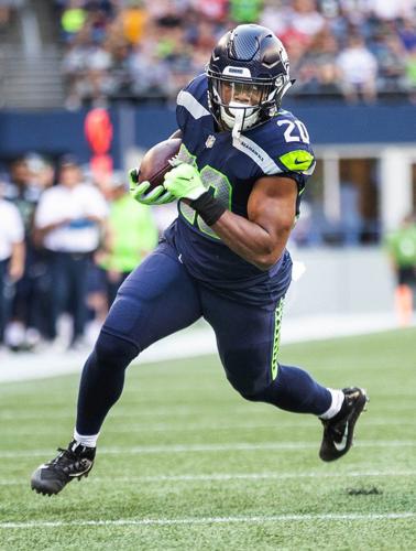 Seahawks' Rashaad Penny works with Marshall Faulk, nutritionist in