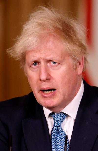Britain's Prime Minister Boris Johnson speaks during a virtual news conference in London