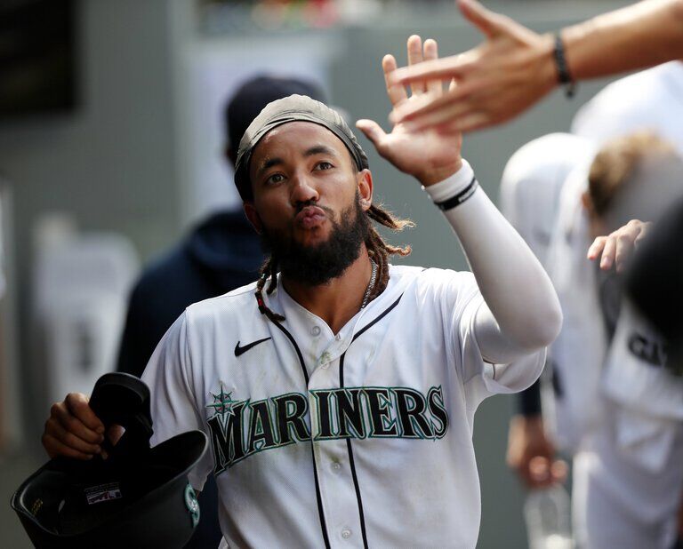 Seattle Mariners' J.P. Crawford takes a swing during an at-bat in