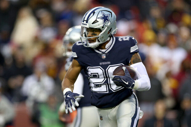 Running back Tony Pollard of the Dallas Cowboys runs the ball for a News  Photo - Getty Images