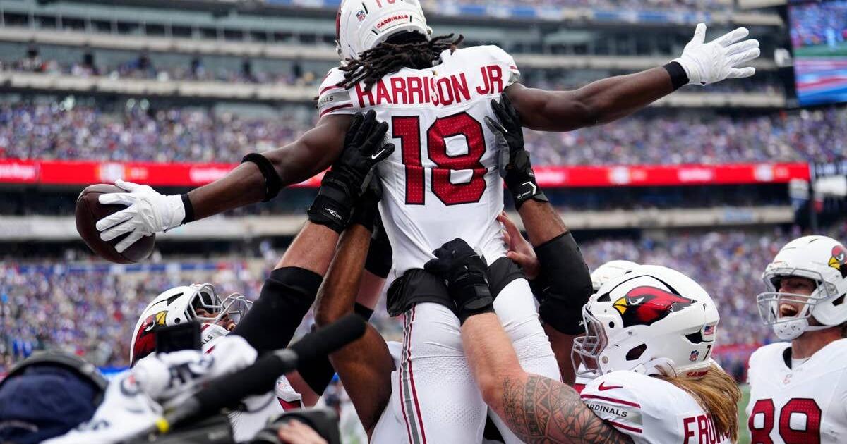 arizona-cardinals-wide-receiver-marvin-harrison-jr-18-is-lifted-in-the-air-by-his-teammates-after-scoring-the-first-touchdown