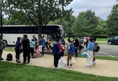 FILE PHOTO: Migrants arrive at Union Station in Washington
