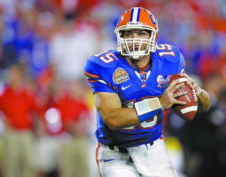 14 Years After Taking Darren McFadden's Heisman Trophy, Tim Tebow Lucks  Back into the NFL - Best of Arkansas Sports