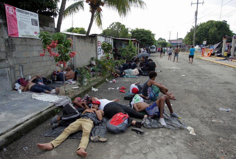 Migrant caravan limps north through Mexico, despite dengue and exhaustion