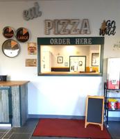 New pizza shop in Quincy is a venture and a tribute