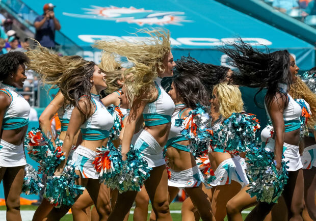 Dolphin Thick: Miami's Saucy NFL Sideline Slayers Are Slanging Shots Of  Their Cheerleader Cakes With Calendar For A Cause!