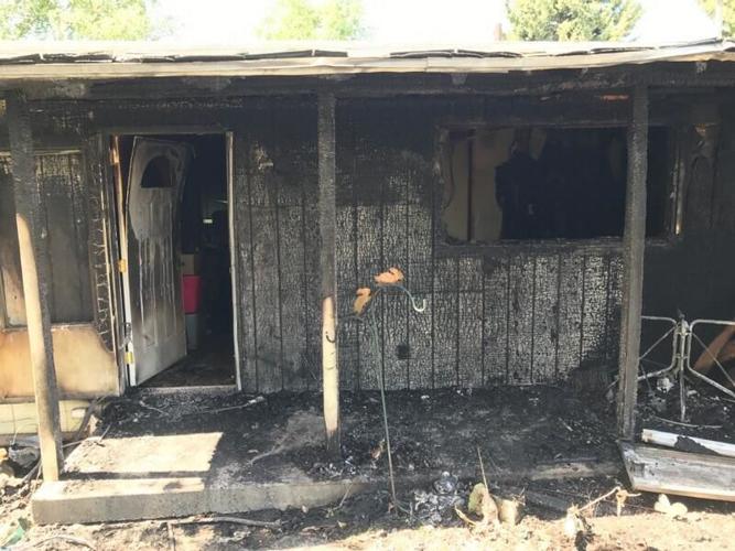 Woman pulled from East Wenatchee house fire, animals perish Local