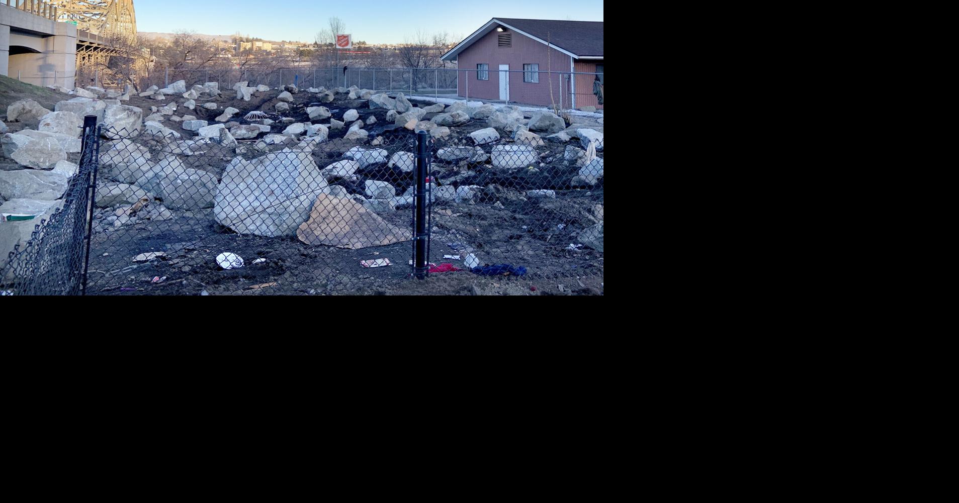 Wenatchee homeless scatter as WSDOT fills former camp with boulders to ...