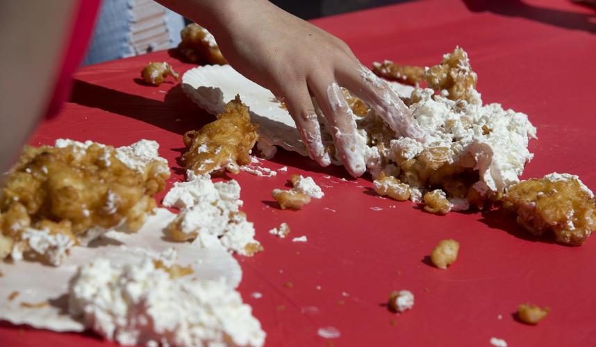 Festival's first Funnel Cake Eating Contest a delightfully messy