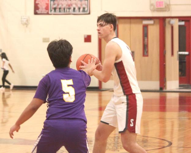 Boys basketball team tops Pateros Empire Press