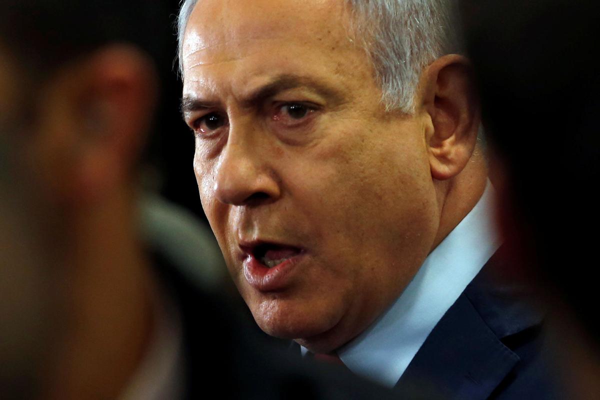 Netanyahu charged in corruption cases, deepening Israeli political