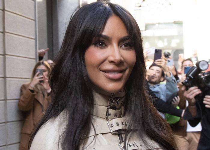 Kim Kardashian Flaunts Tiny Waist in Leggings and Cropped Pink Jacket, Parade Magazine