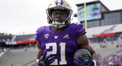 Ngata Is One of Those Counted On to Fill UW RB Void Left by