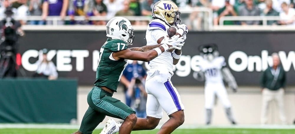 Why do the Washington Huskies wear their jersey numbers? 'No. 1