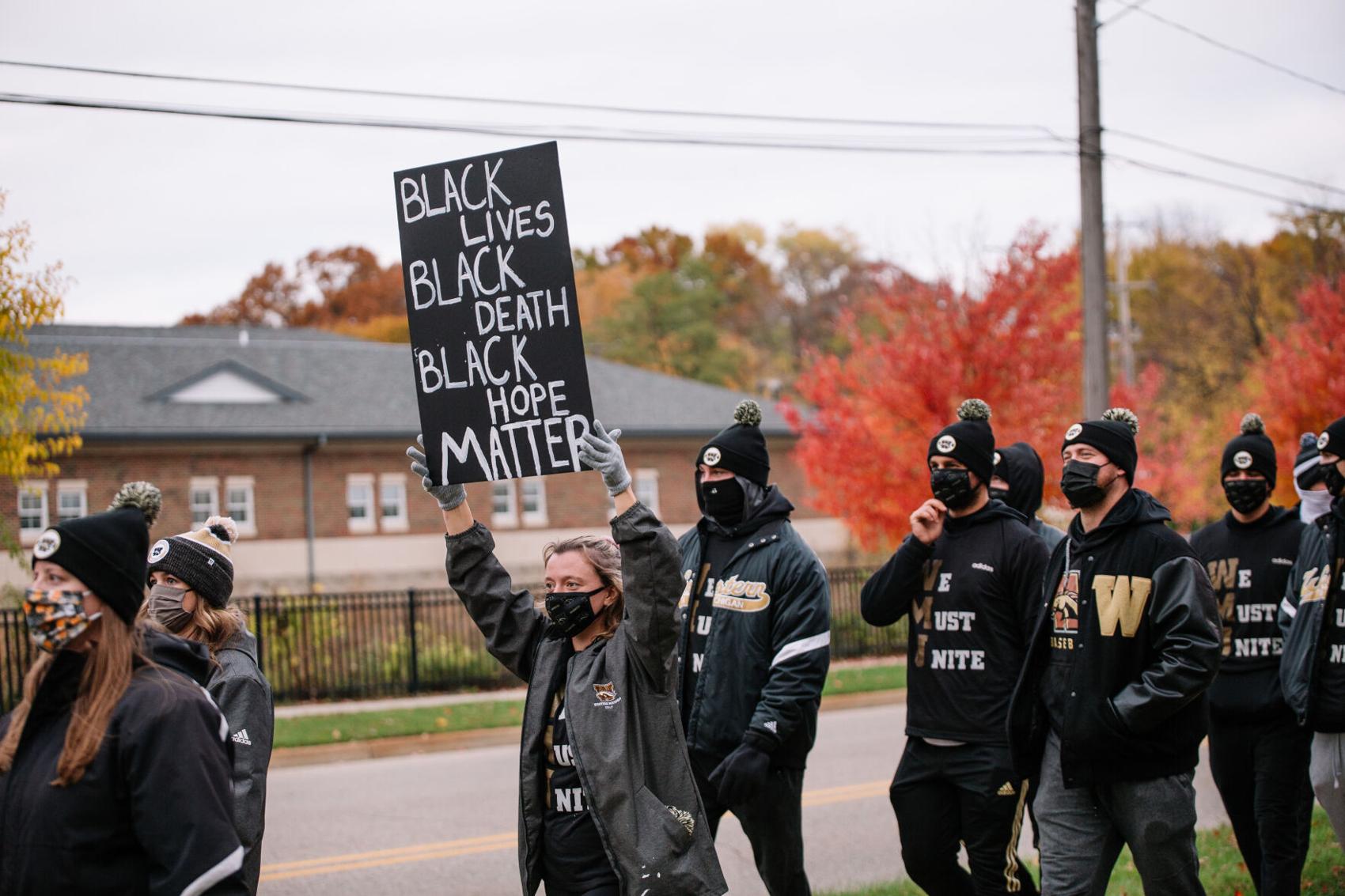 We Must Unite BLM sign