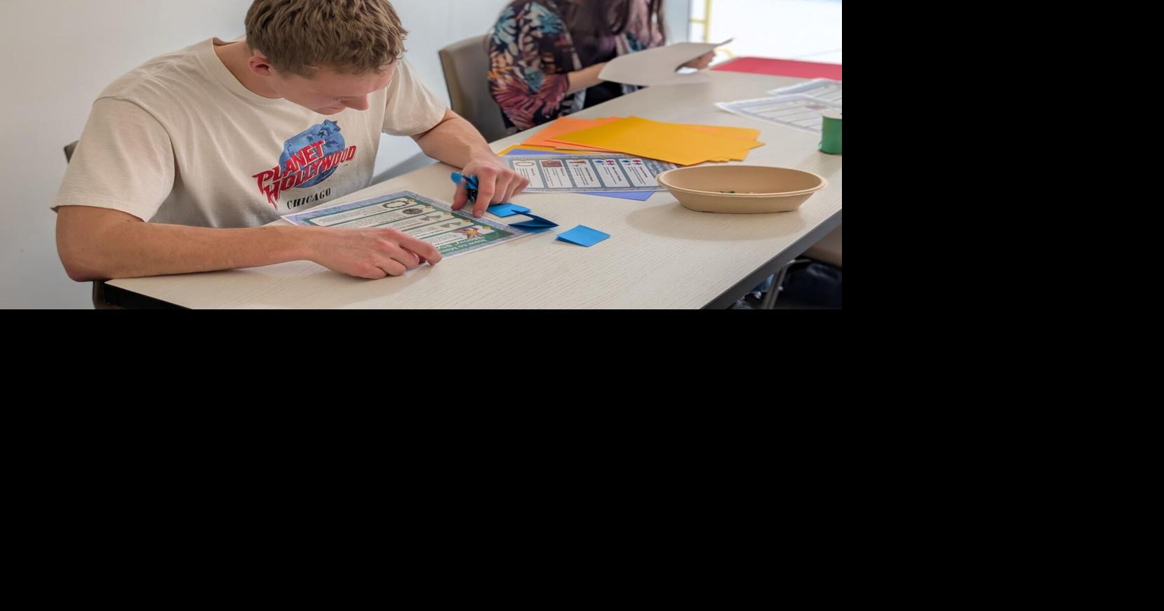 Global Engagement Program celebrates Asian American Pacific Islander heritage through the art of lei making