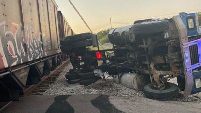 Semi hit by train in Webster County