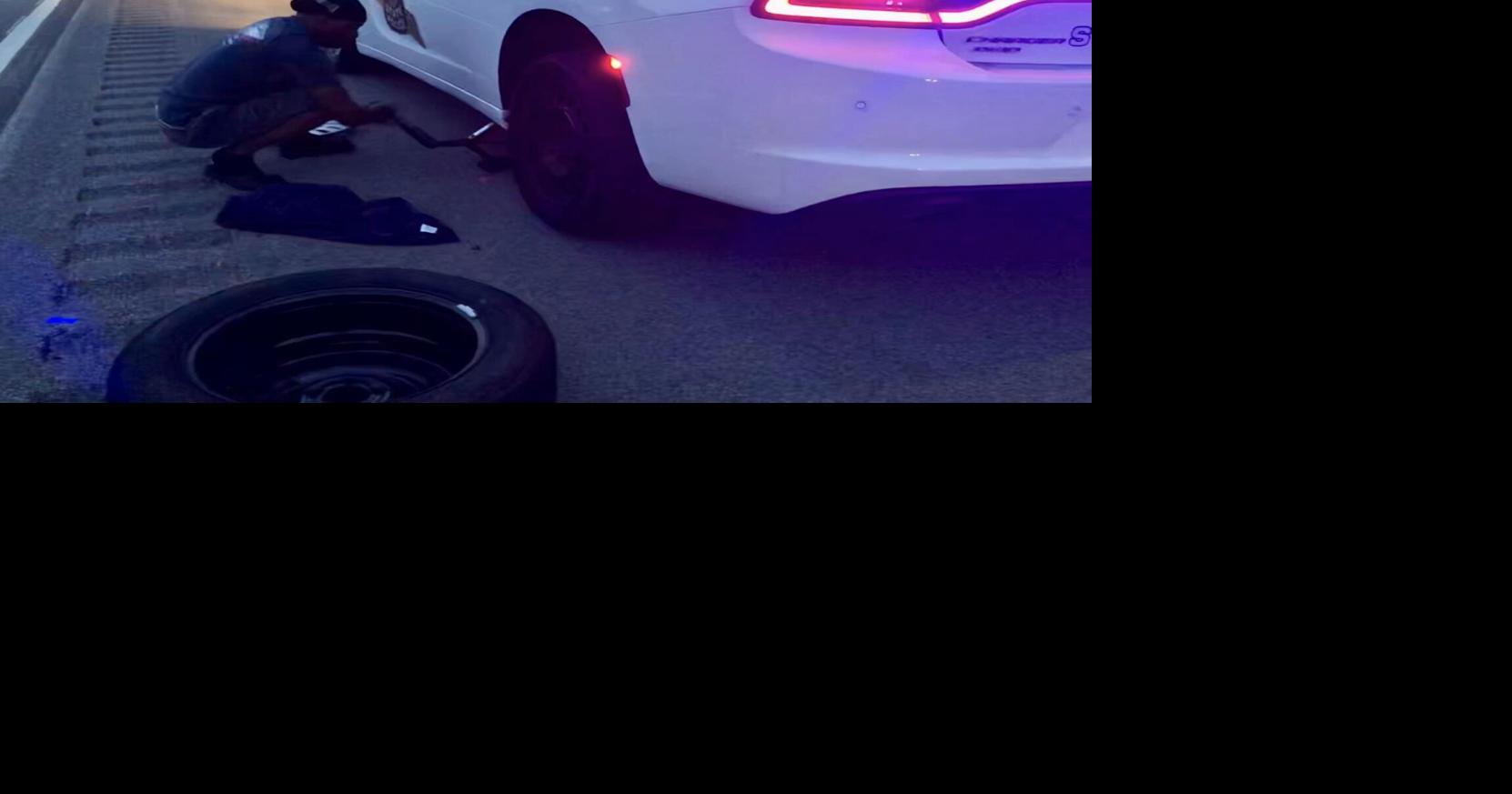 Truck driver stops to help Evansville area ISP trooper change flat tire