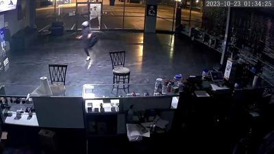 Security camera footage shows break-in and burglary at Evansville vape shop