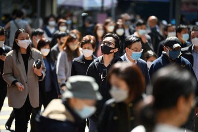 Hong Kong scraps mask mandate after nearly three years
