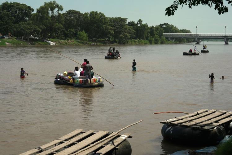Families board makeshift rafts to get closer to the US | News | wfft.com
