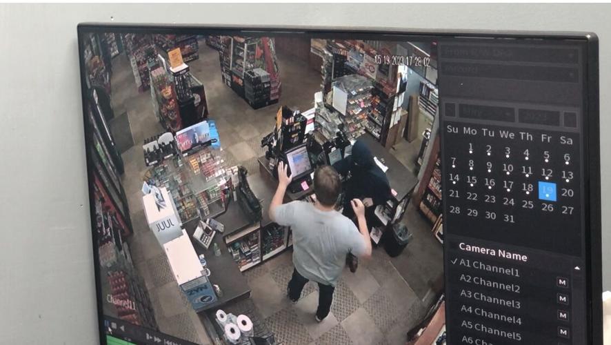 Security footage of person robbing convenience store