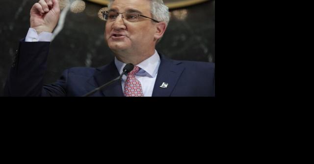 Indiana governor vetoes transgender girls sports ban, signs ...
