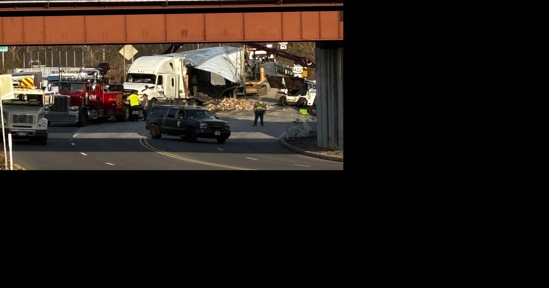 Truck crash sends cans of mushrooms across highway
