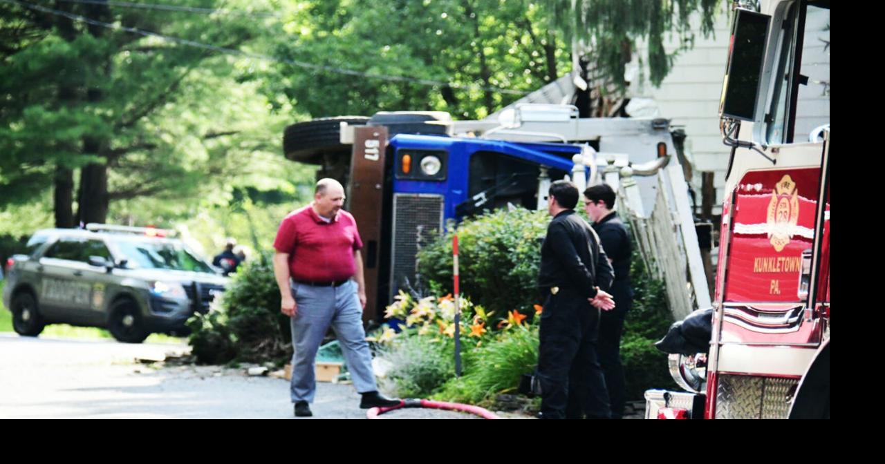 Driver dies after garbage truck crashes into home, rolls | News | wfmz.com