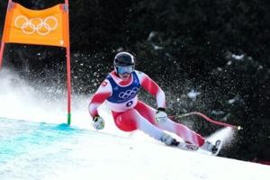 Von Allmen wins men's Olympic downhill gold, first of Games