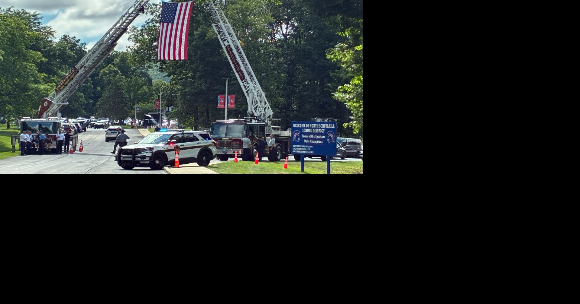Flag hangs from archway as community remembers Pa. State Police Trooper Michael Pahira Jr. 7-8-26
