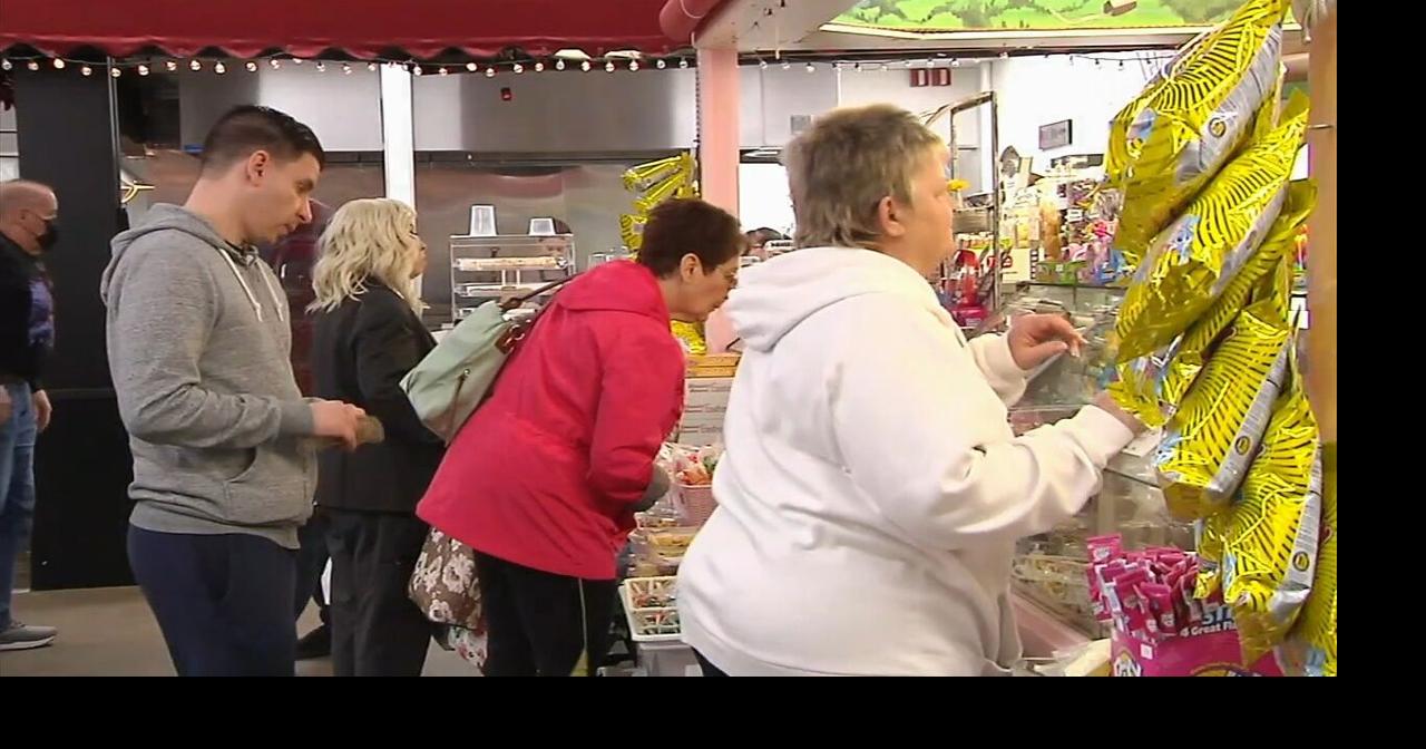 Customers shopping at the Allentown Farmers Market for this weekend's