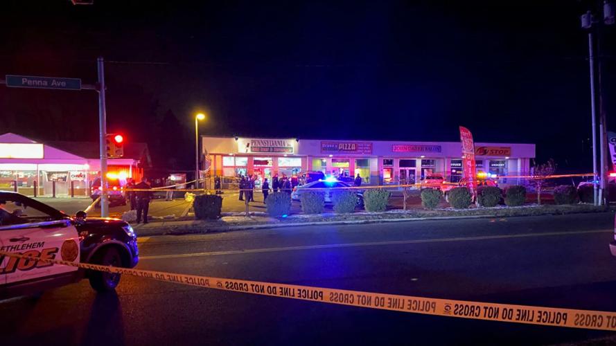 Allentown police close off strip mall set up crime scene tape after