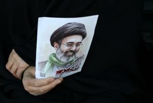 Iranians pay tribute to slain supreme leader weeks after killing