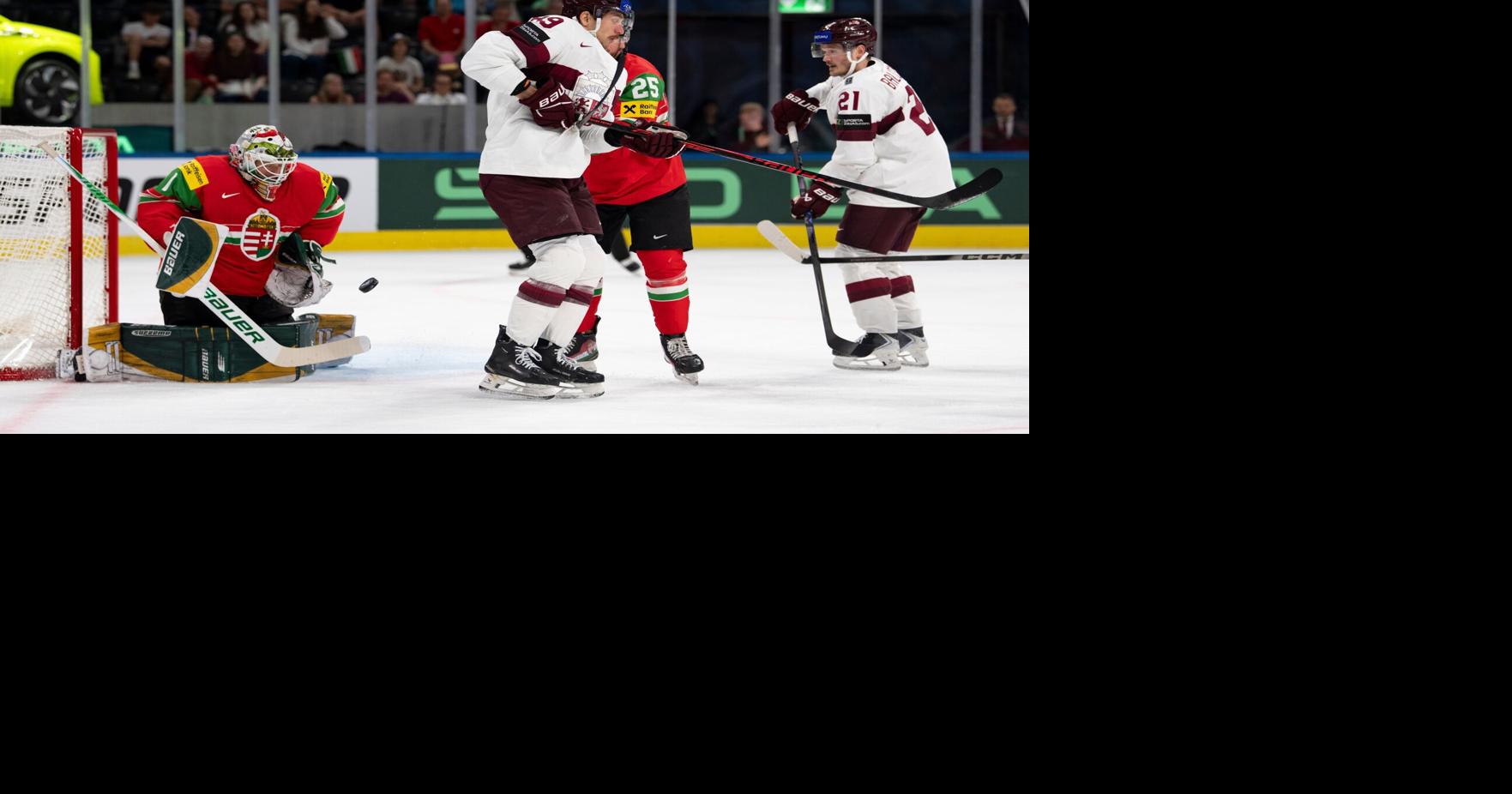 Latvia routs Hungary 8-1 to reach quarterfinals at ice hockey worlds