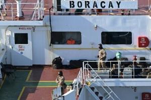 Two Russian security personnel were on board France-seized tanker: sources