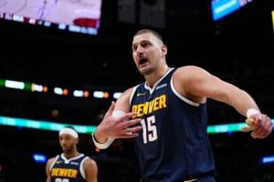 Jokic suffers 'gut-wrenching' knee injury as Nuggets thrashed