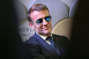 Macron squares up to Trump in rebel shades at macho Davos gathering