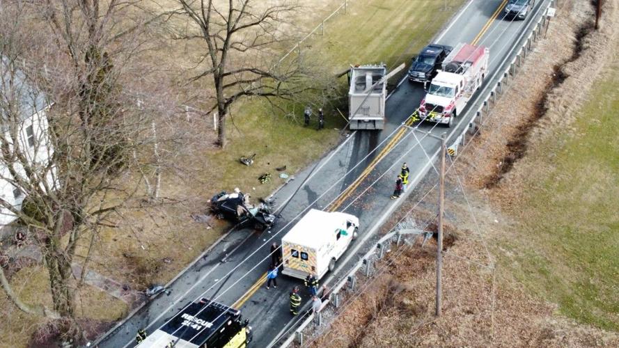 Injuries reported after dump truck, car crash in Lower Mount Bethel