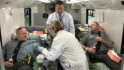 PSP Troopers roll up their sleeves to honor Cpl. Seth Kelly | Lehigh ...