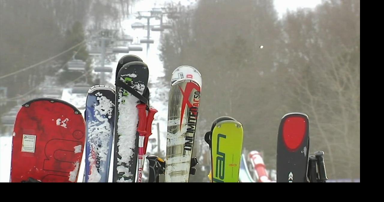 Skiers and snowboarders enjoy fresh powder and cold weather at Camelback Resort