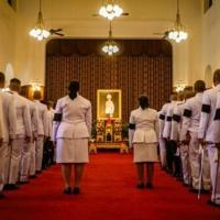 Officials line up to pay respects in front of a portrait of the late Thai Princess Bajrakitiyabha Mahidol in the royal throne hall at the Grand Palace in Bangkok on June 13, 2026.
