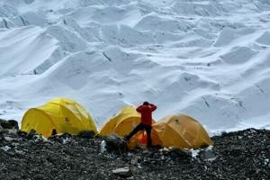 Climbers open Everest route past dangerous ice block