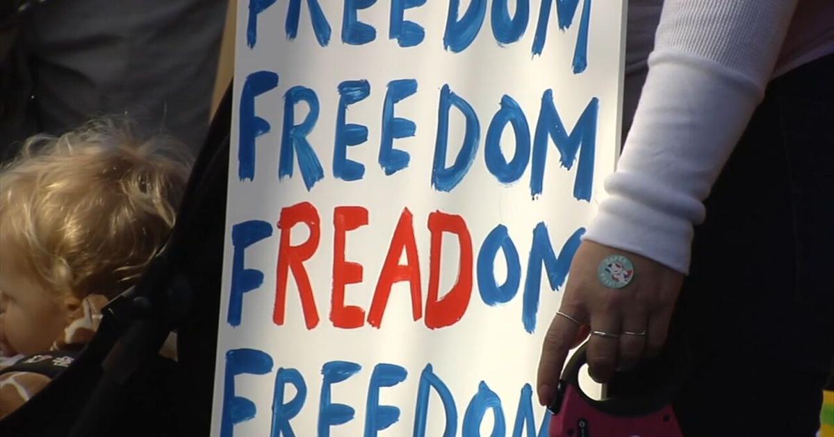 Demonstrators march for Banned Book Week