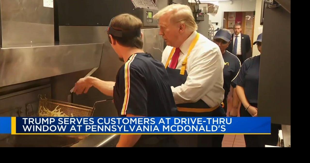 Donald Trump serves french fries at a McDonald's in Bucks County ...